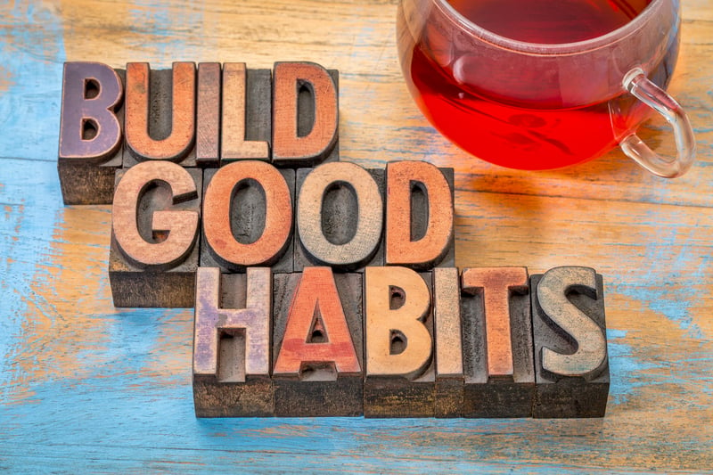 Sign that reads "build good habits."