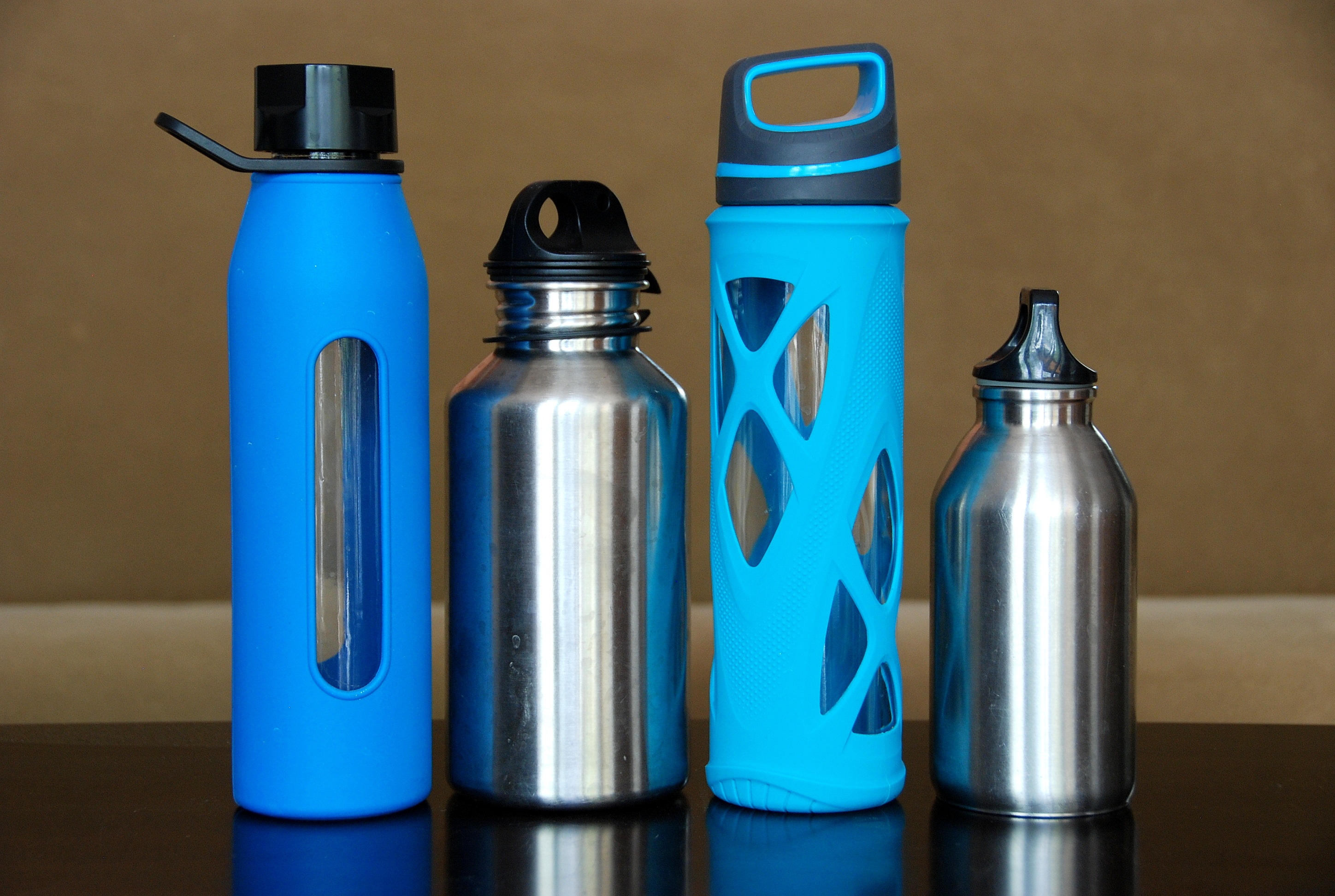 Plastic and aluminum water bottles.