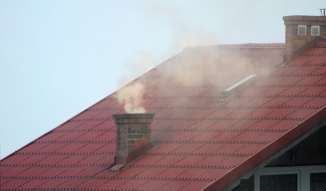 Smoke coming out of a chimney.