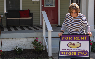 putting up house for rent sign