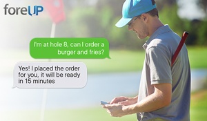 golfer reading text sent with foreUP