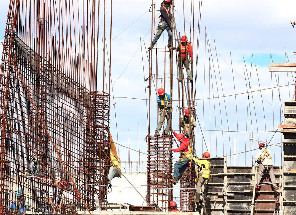 An image of construction workers. Find employees who are a good cultural fit for your organization.