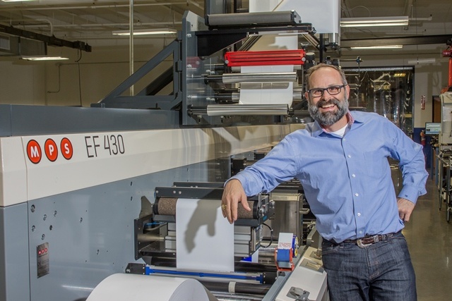 1. Thomas Dahbura, President of Hub Labels Inc. with the new MPS EF press