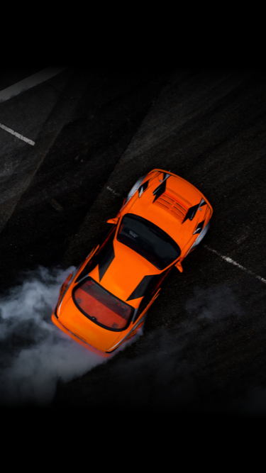 An aerial shot of a new car on a test drive.