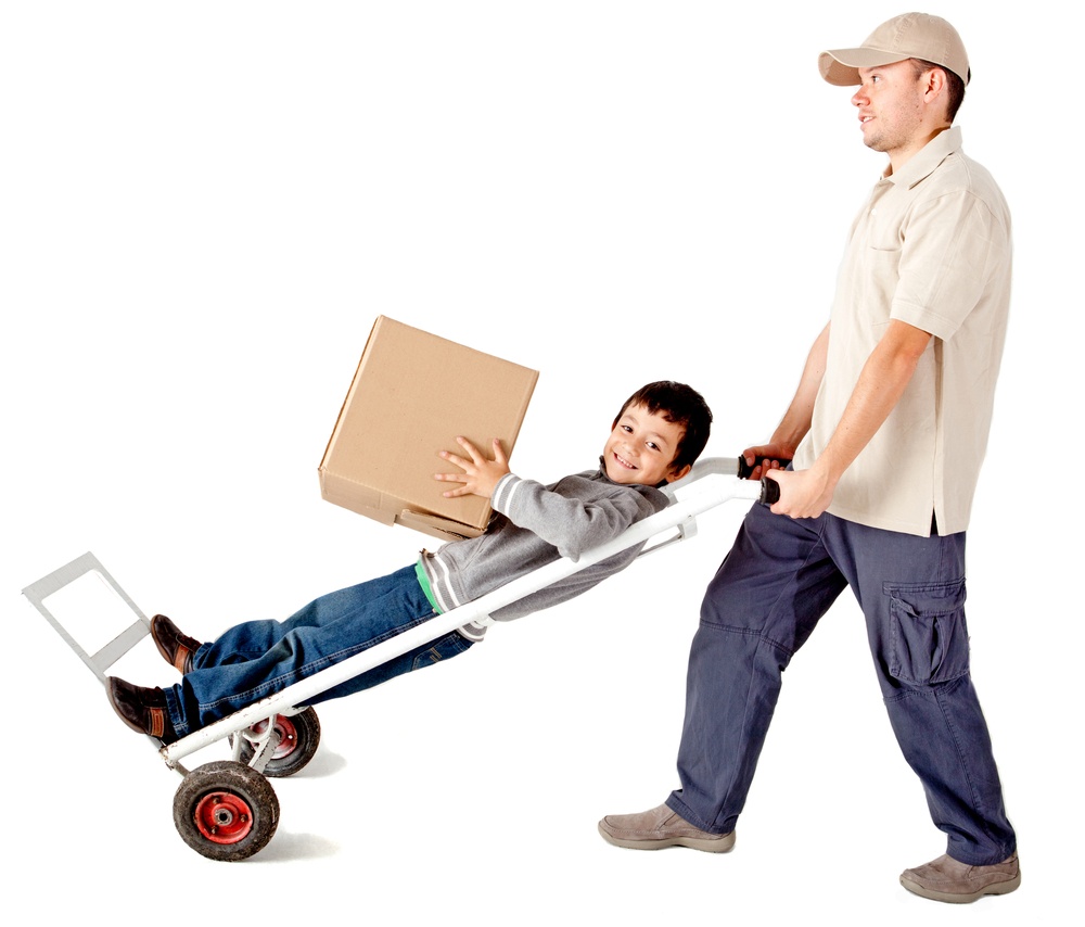 Delivery man carrying a boy in a trolley - isolated over a white background