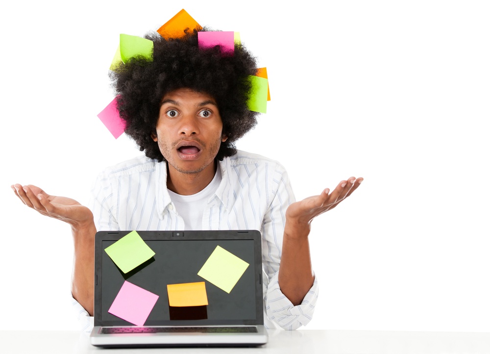 Overwhelmed afro man with post it notes - isolated over a white background