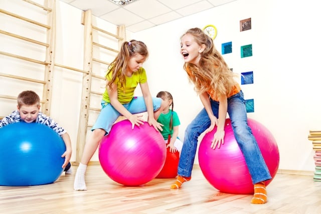 Therapy Ball Exercises & Activities for Kids - The Inspired Treehouse