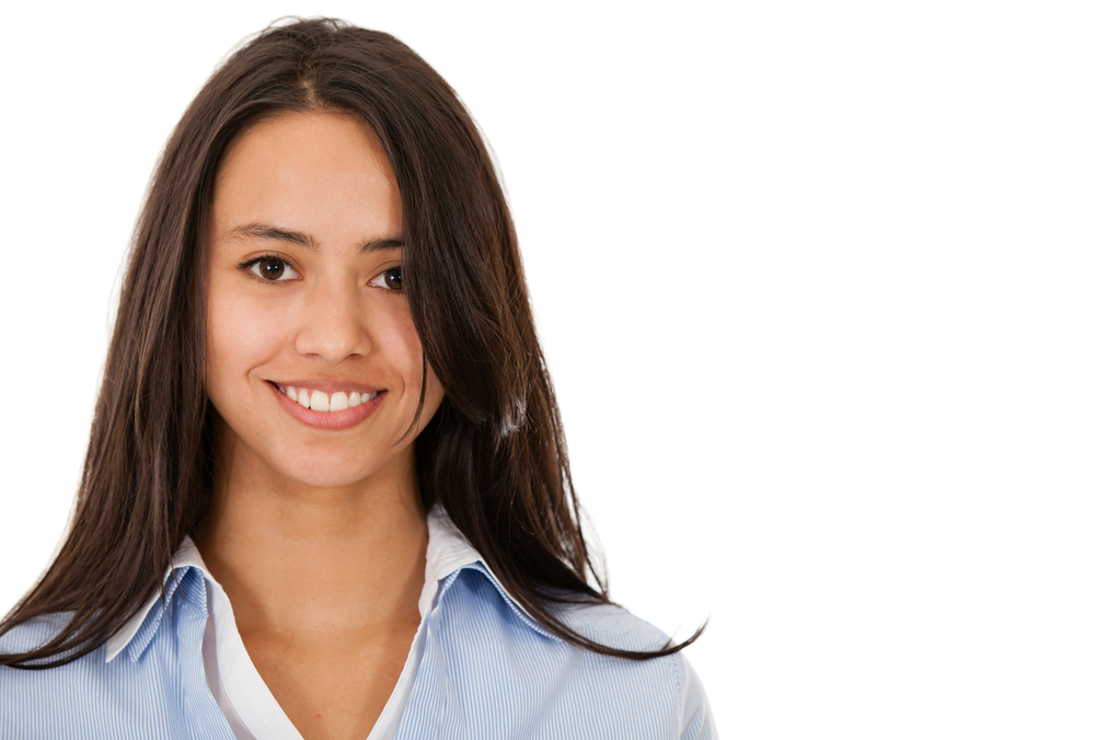 Casual woman smiling - isolated over a white background