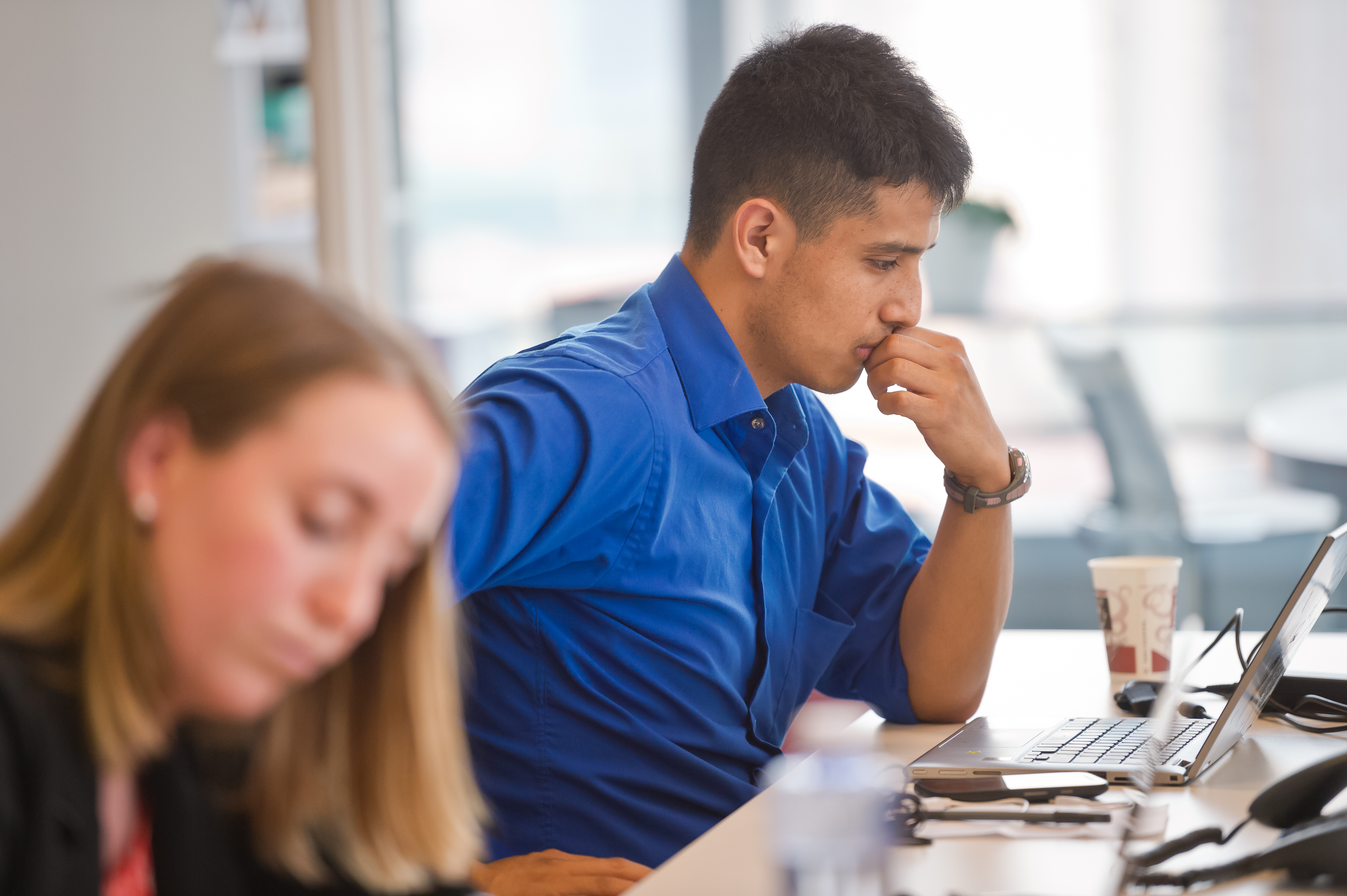 Absolute intern looking at computer