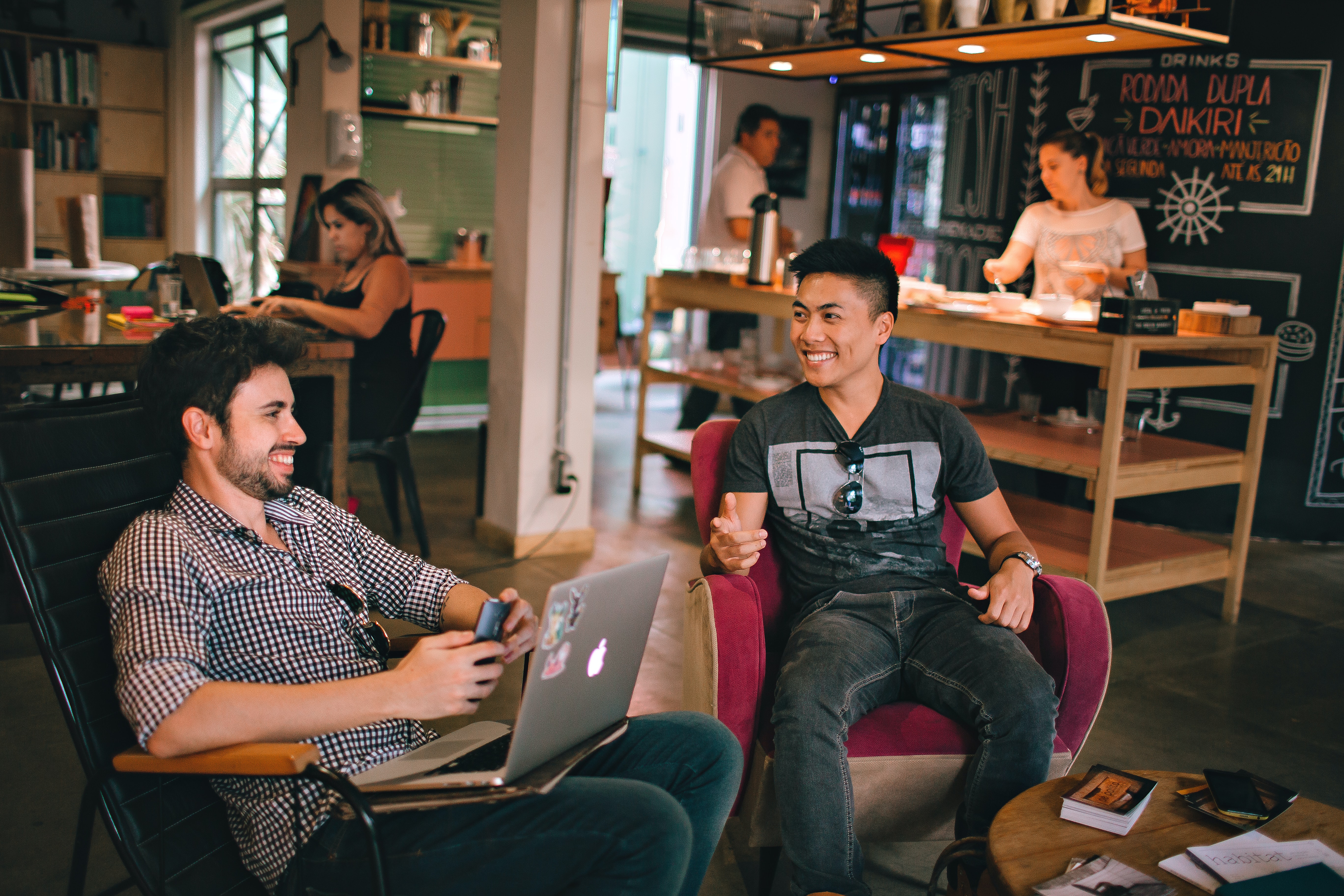 Two men working from a co-working space