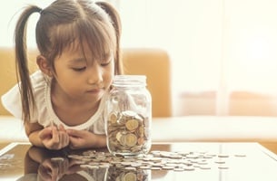 Asian-Girl-Counting-Change-Newsletter-Learning-Hub-Template