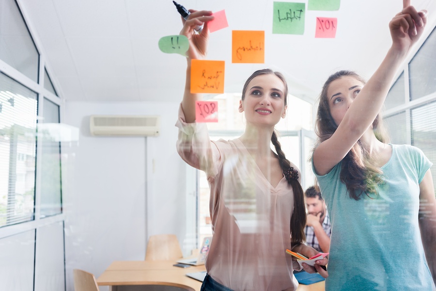 BS 2 female office coworkers with post its-1