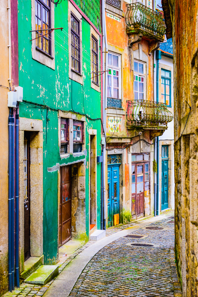 Quaint neighborhood alleyway in Porto, Portugal.