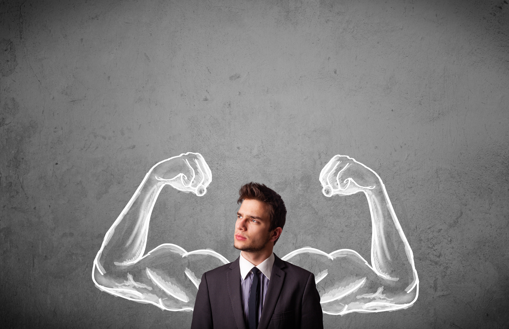 Young businessman wondering with sketched strong and muscled arms