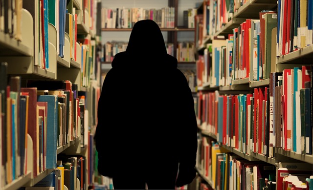 autistic person walking in bookstore