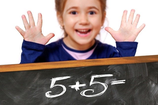 child-adding-five-plus-five