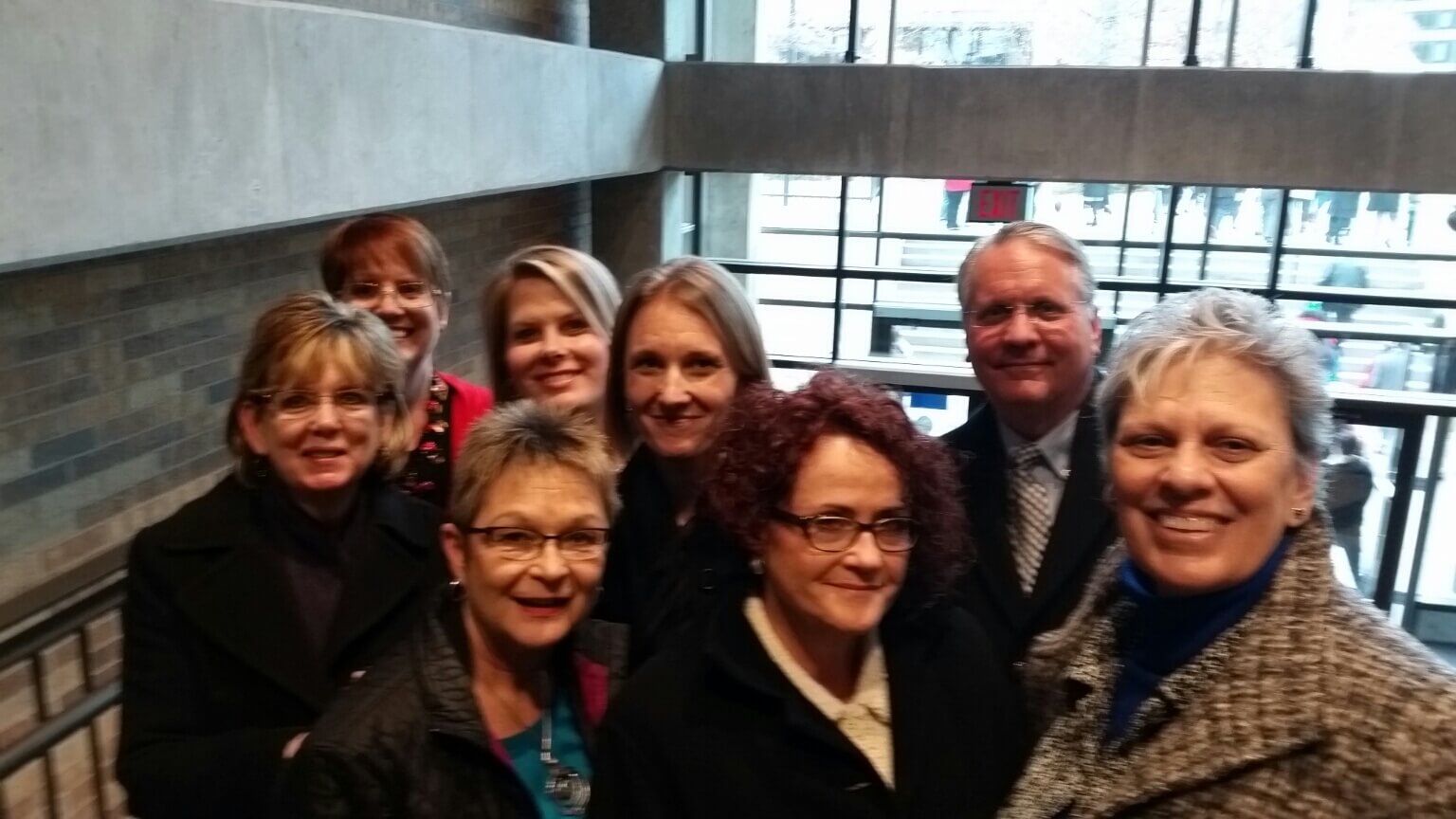 Front: Deb Crowl, Cheryl Firsching, Leadell Ediger Middle row: Elaine Edwards, Tanya Koehn, Dean Olson Back row: Reva Wywadis and Angie Saenger