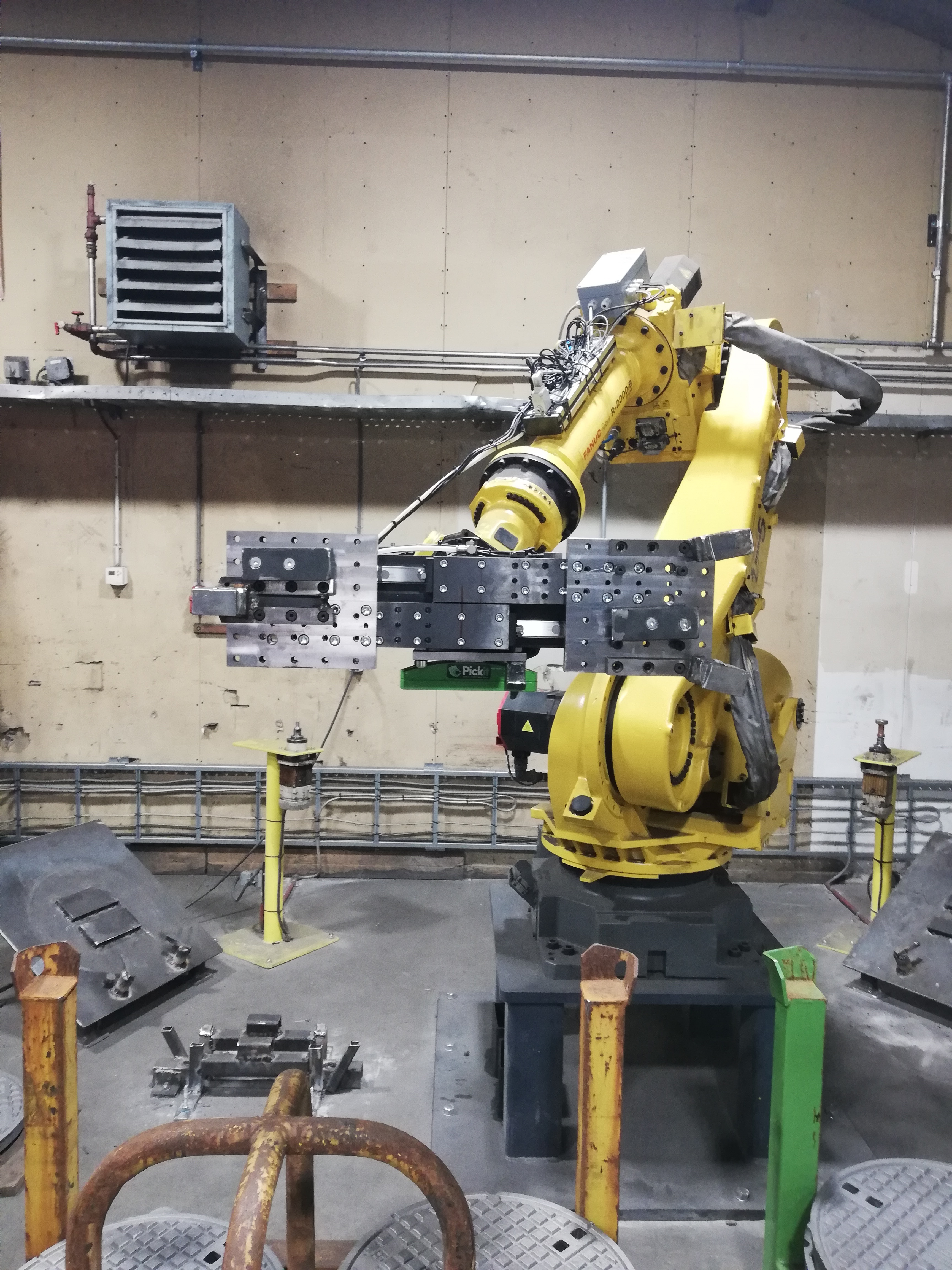 Pick-it 3D camera with Fanuc robot picking cast iron disks at Rademakers Foundry in the Netherlands.