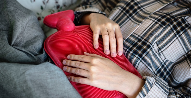 a pregnant woman with blocked fallopian tubes using an ice pack