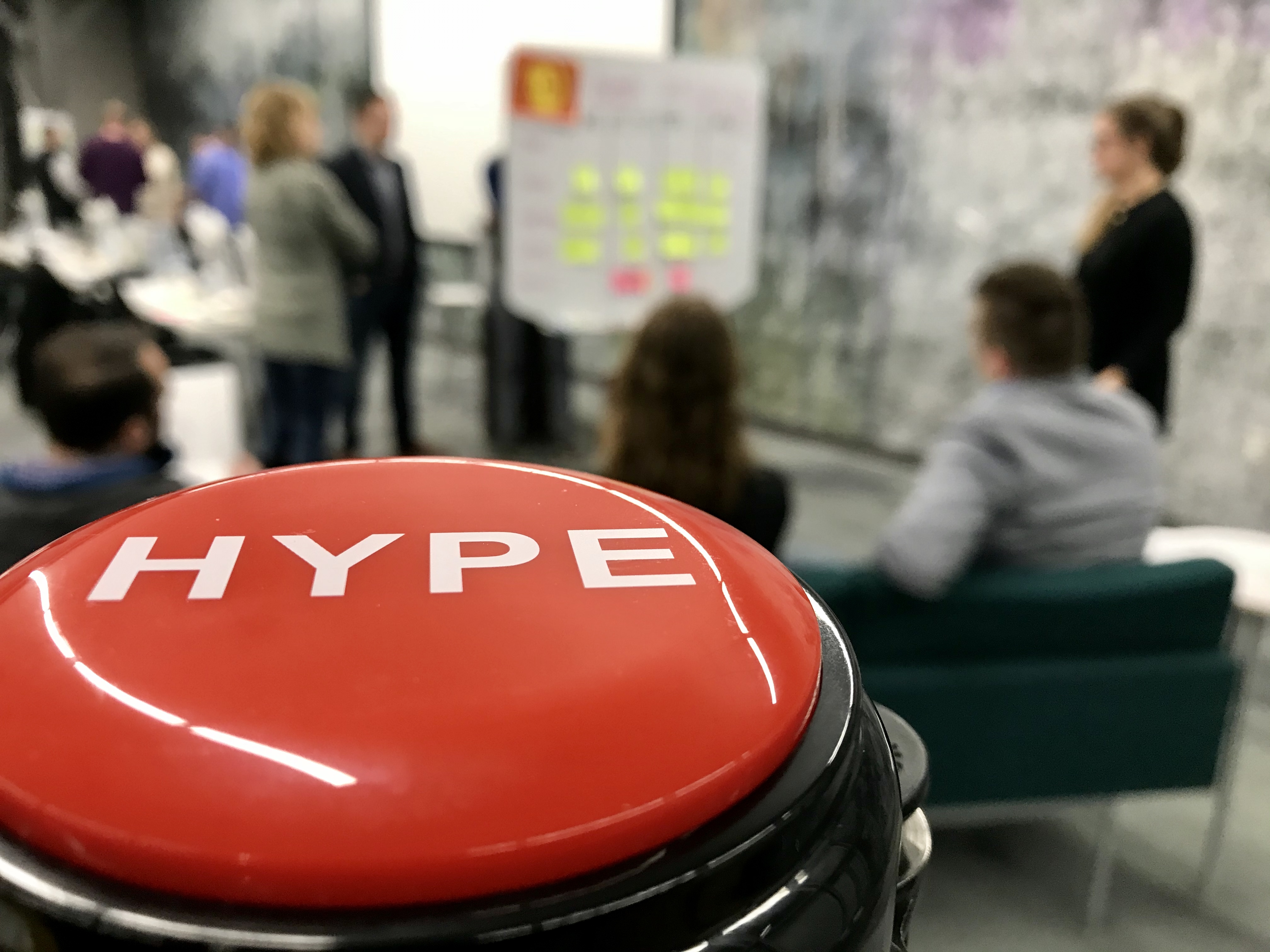 The SPARK HYPE button is shown in a team meeting.