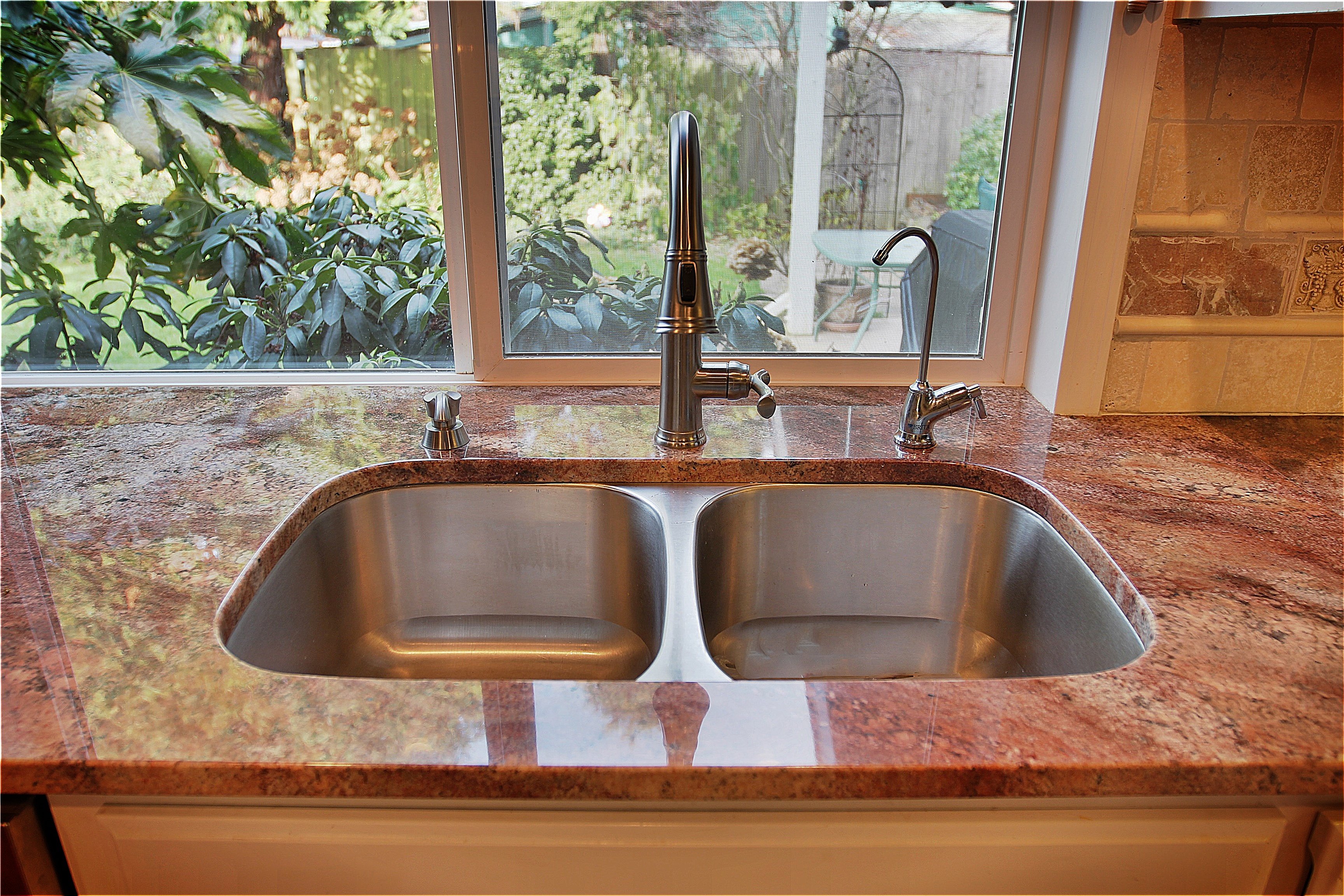 attaching a kitchen sink to granite counter top