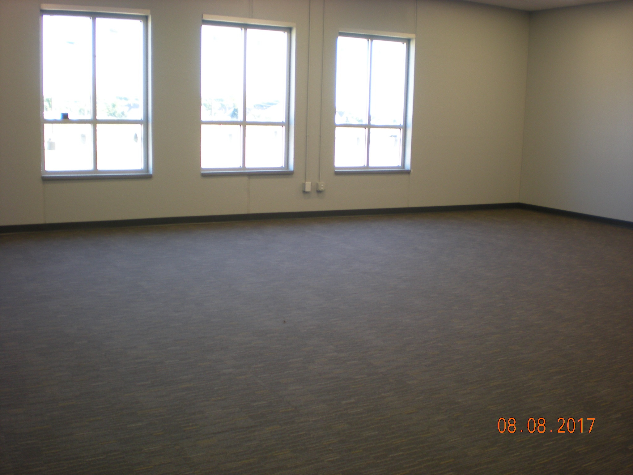 2017-08-08 CHA Project Nears Completion - picture of empty classroom with flooring.jpg