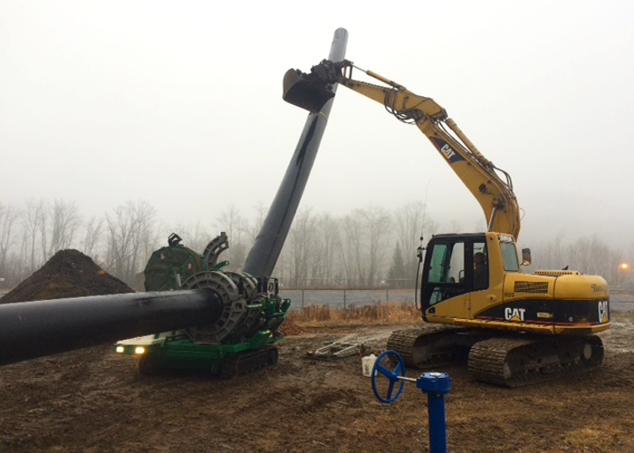 Excavator with HDPE Pipe Excavator with HDPE Pipe