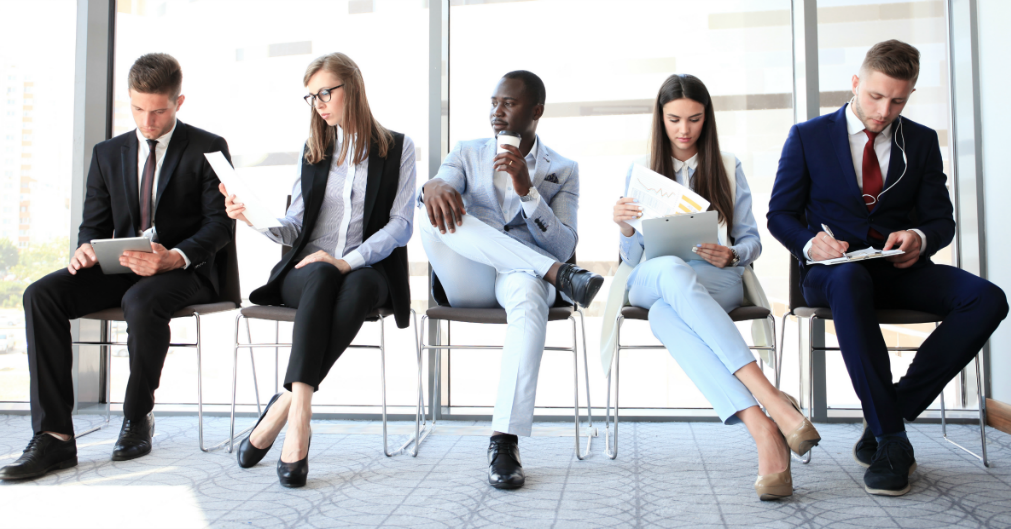 People Waiting in Chairs for Job Interview | SupportingStrategiesFranchise.com