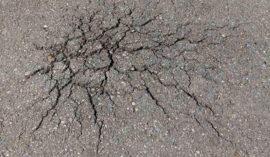 Top Causes of Cracks in Asphalt Pavement