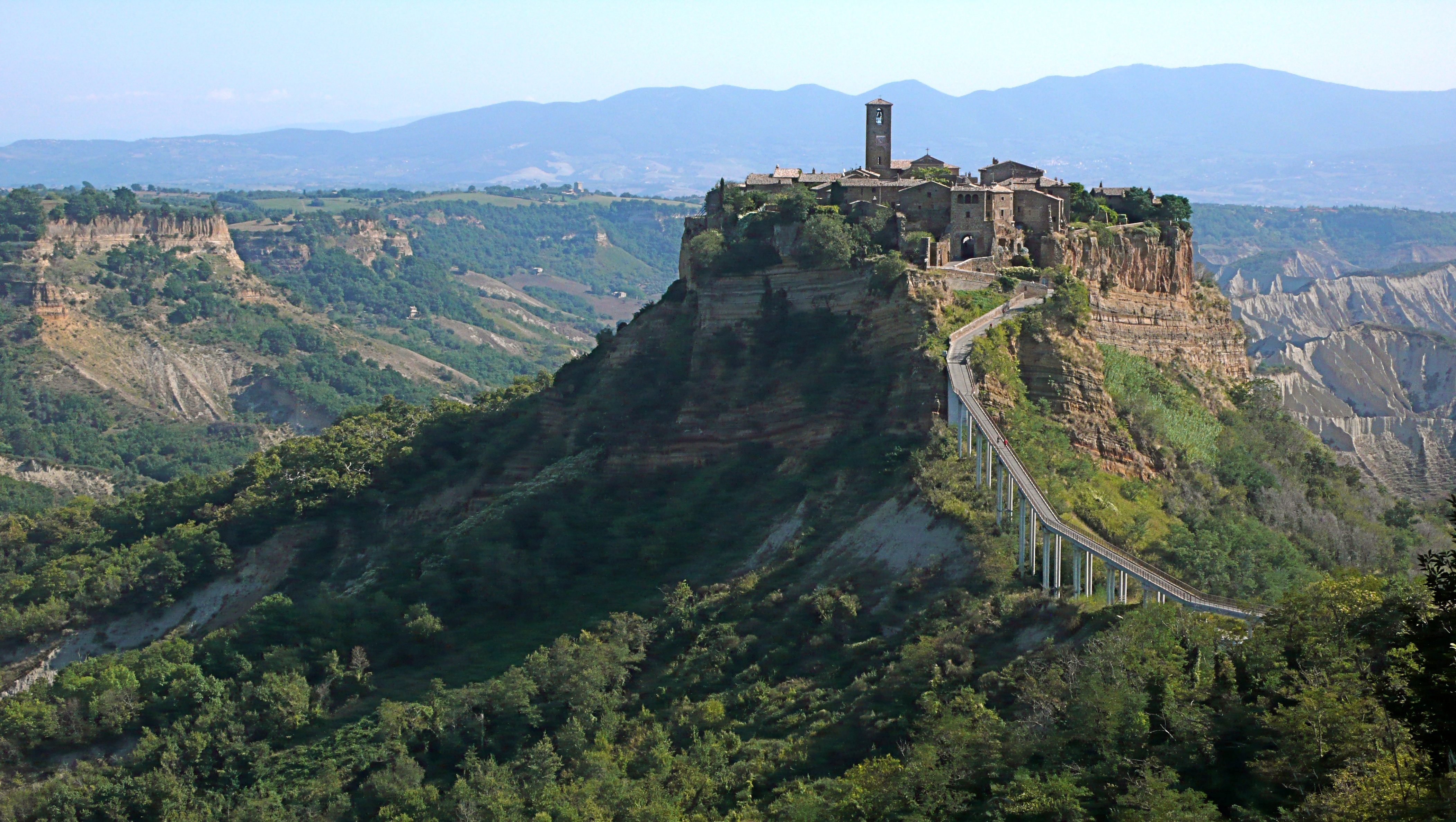 A distant photograph of Civita di Bagnoregio in Italy. 