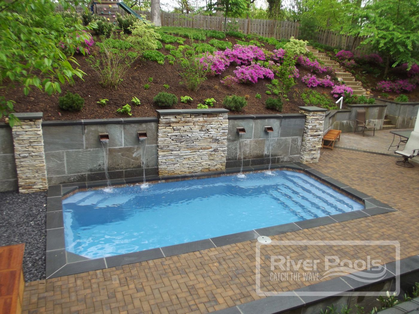 How To Build A Pool What To Do With A Sloped Backyard Sloped Backyard Building A Pool Backyard Pool Landscaping