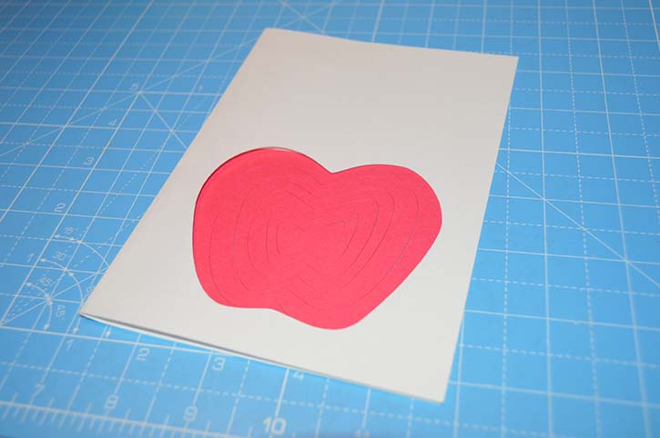 glue-dots-spiral-apple-card-placed-on-card.jpg
