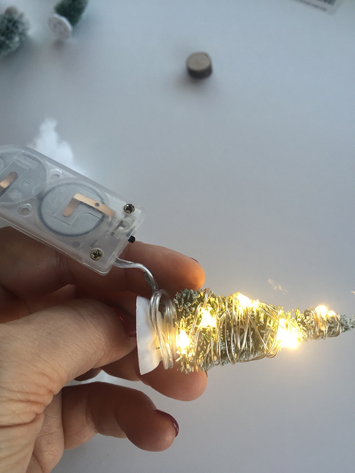glue-dots-rustic-lighted-ornament-wrapping-led-lights-around-tree.jpg