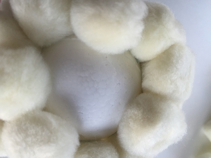 glue-dots-rustic-pom-pom-ornament-adding-pom-poms.jpg