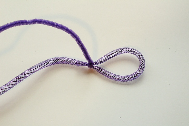 glue-dots-halloween-spider-decoration-mesh-tubing-bow-step1.jpg