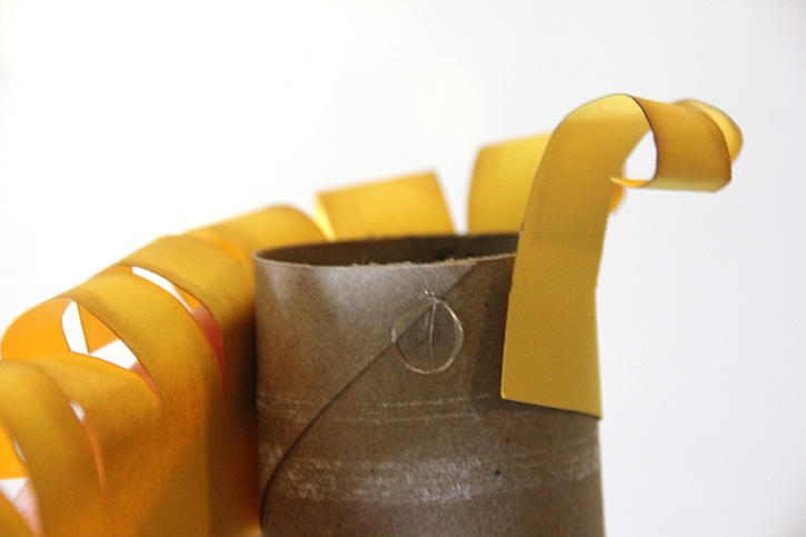 glue-dots-paper-pineapple-fringe-glued-to-toilet-paper-roll.jpg