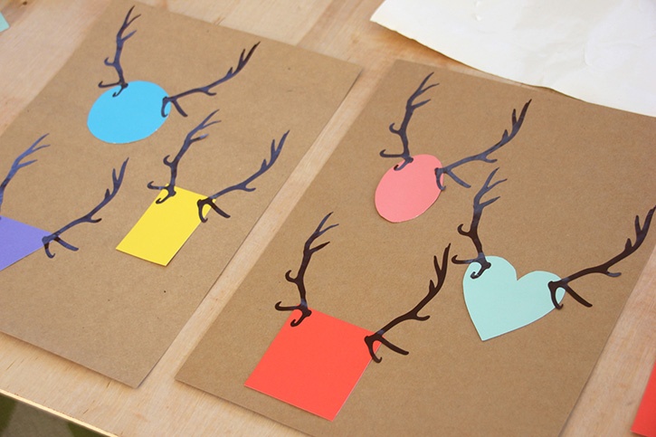 glue-dots-reindeer-shape-cards-paper-pieces-antlers-adhered-to-cards.jpg