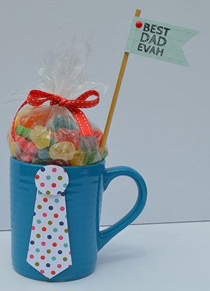 Need a small gift that's easy to put together for Father's Day? Make a candy mug. All you need is paper, Glue Dots, candy, and a mug.
