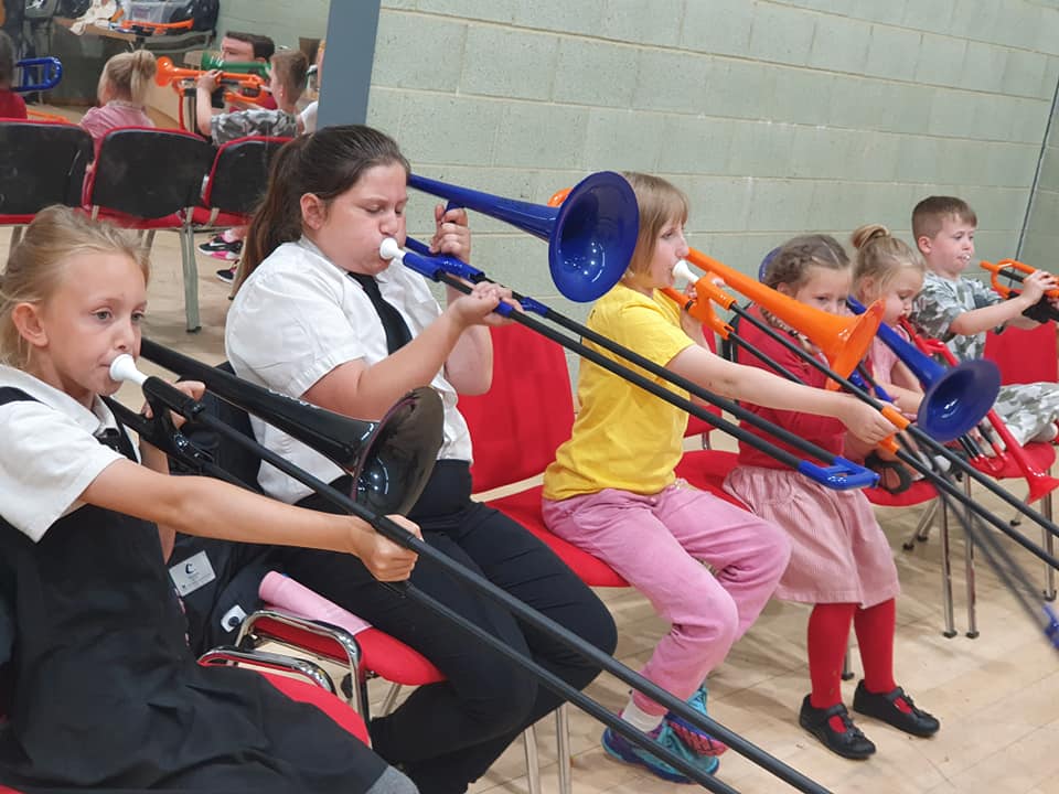 Children from Back Chat Brass playing pBones.