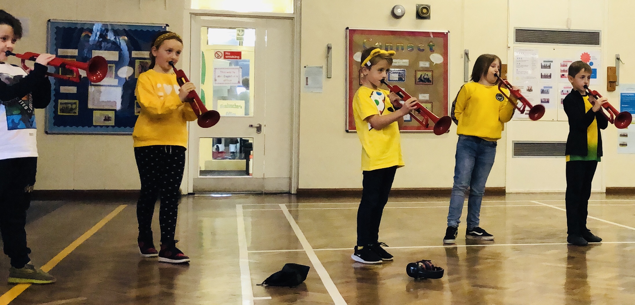Pupils at Coit Primary School play the pBugle