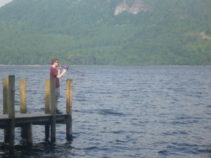 Peter playing his pBone in the Lake District.