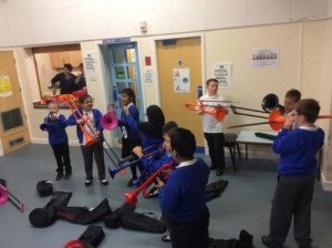 Students with a collection of pBone instruments.