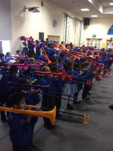 Children playing the pBone in class.