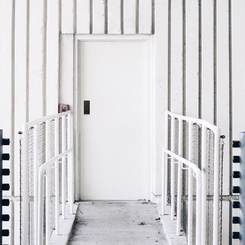 Deadbolt on white door - Infrastructure