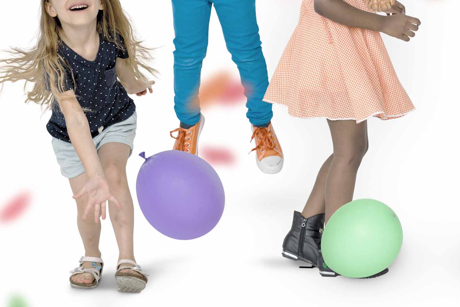Kids stomping on purple and green balloons_Not Your Usual Party Games for Kids
