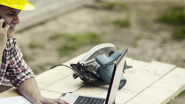 Contractor Using Construction Technology in the field