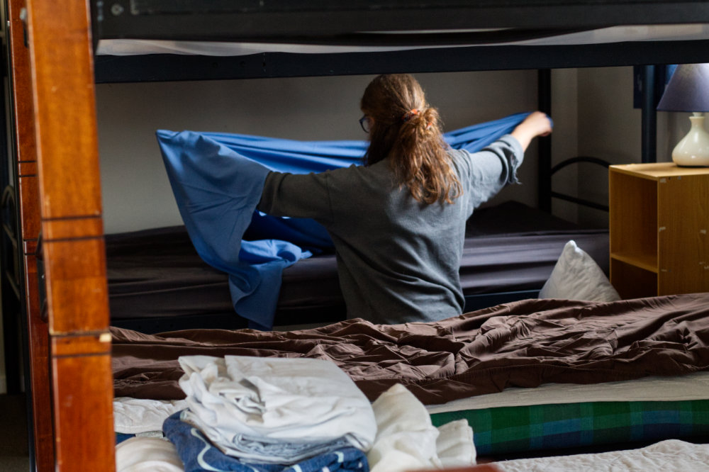 hospitality-making-beds-ywam-volunteer-in-missions