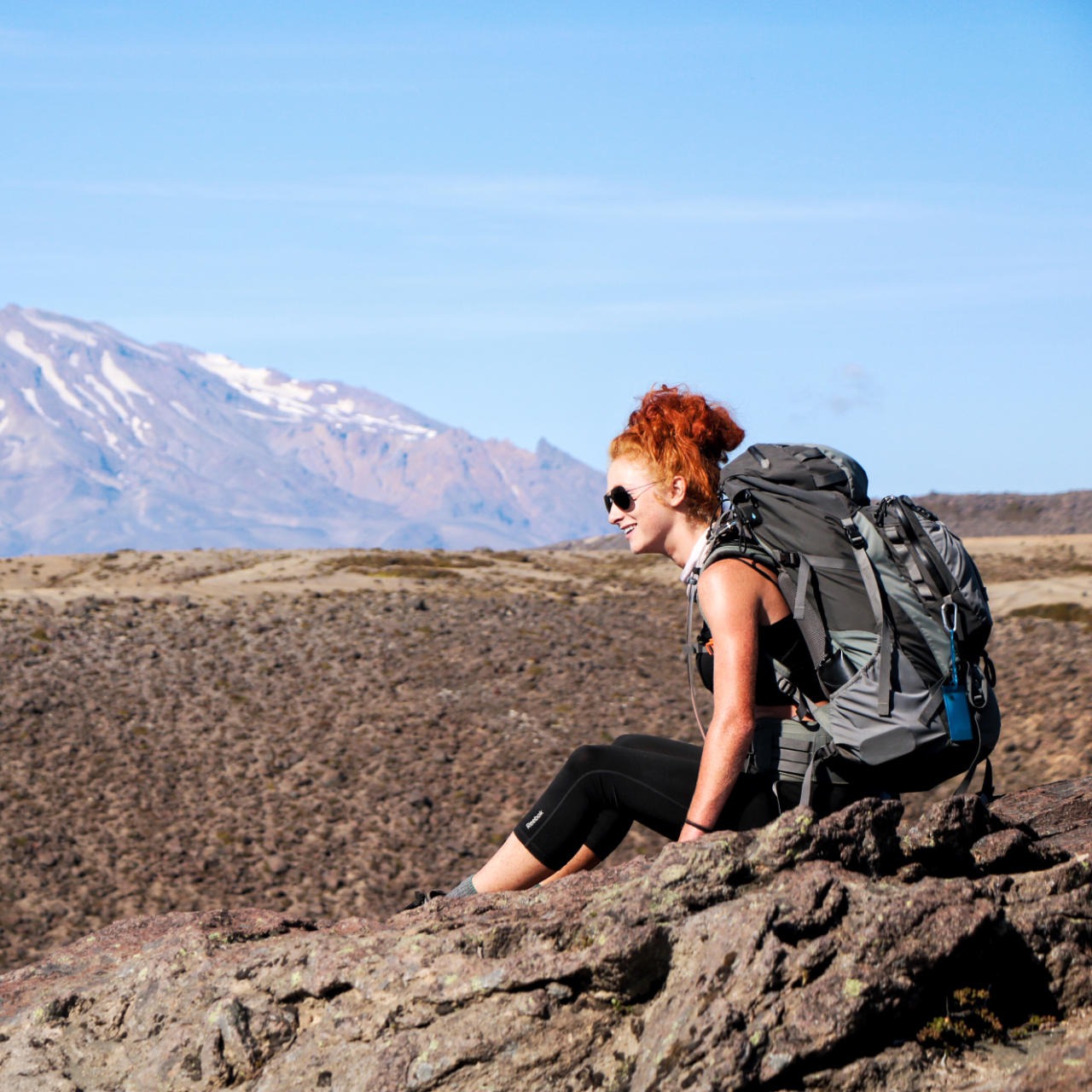 woman-on-rock-mountain-view