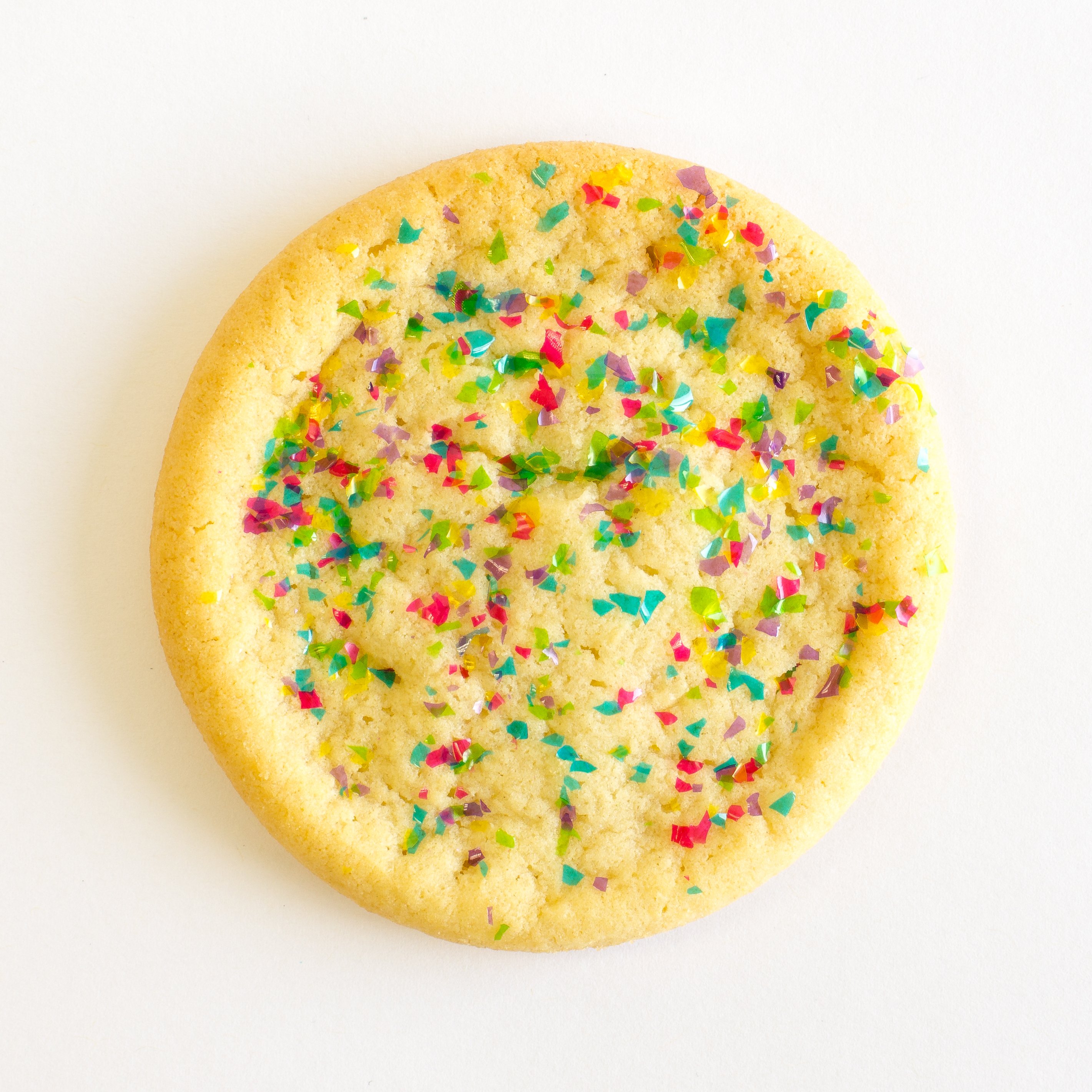 Carnival Edible Glitter Baked on a sugar cookie
