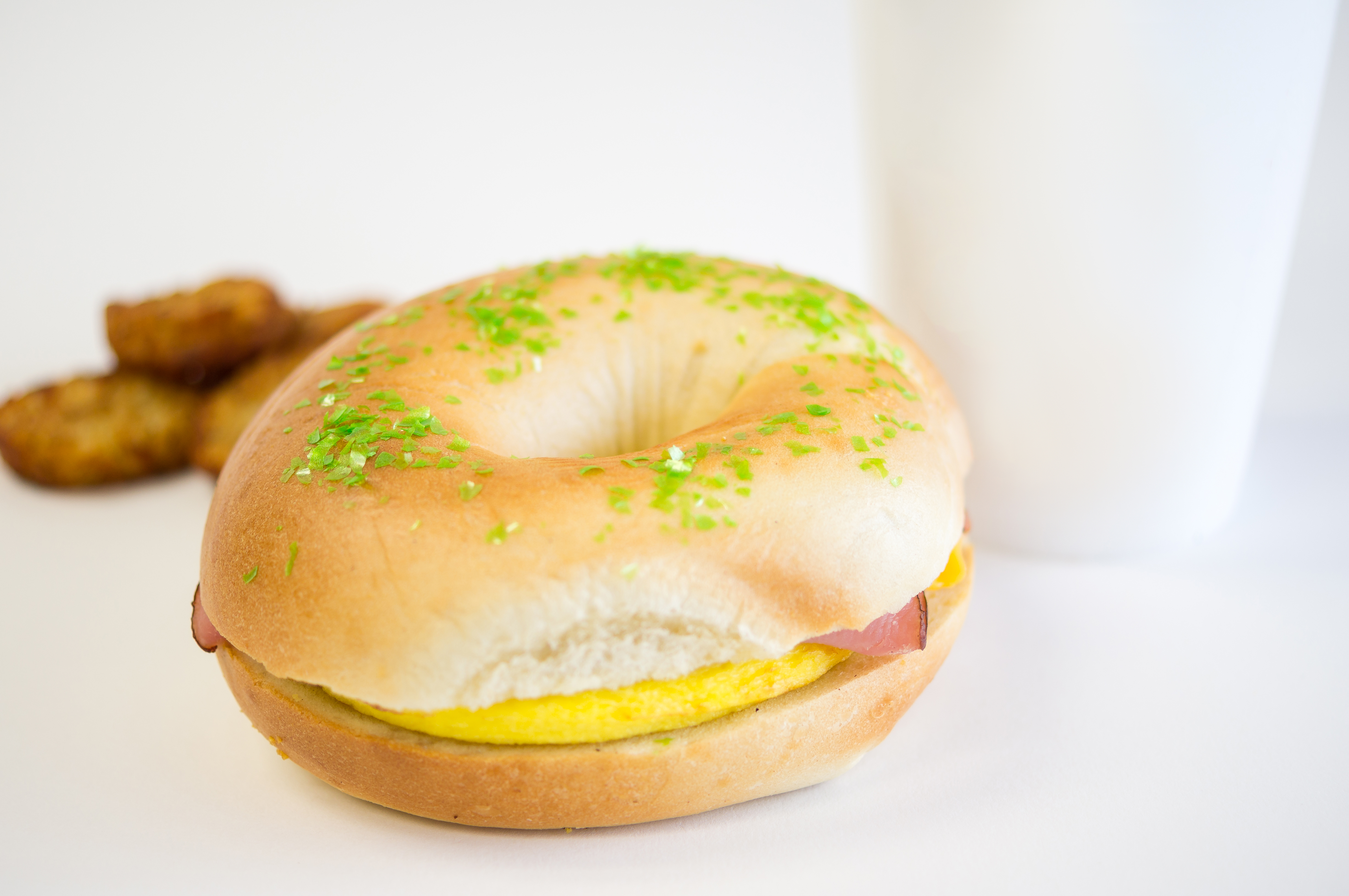 Green Edible glitter on a bagel